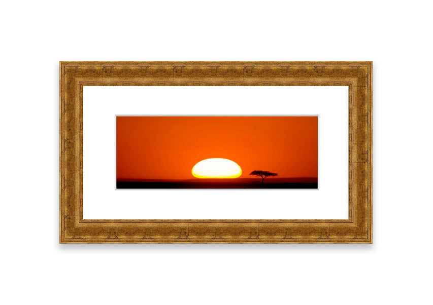 A beautifully framed print of an African sunrise, showcasing vibrant colors and serene landscape, ready to hang.