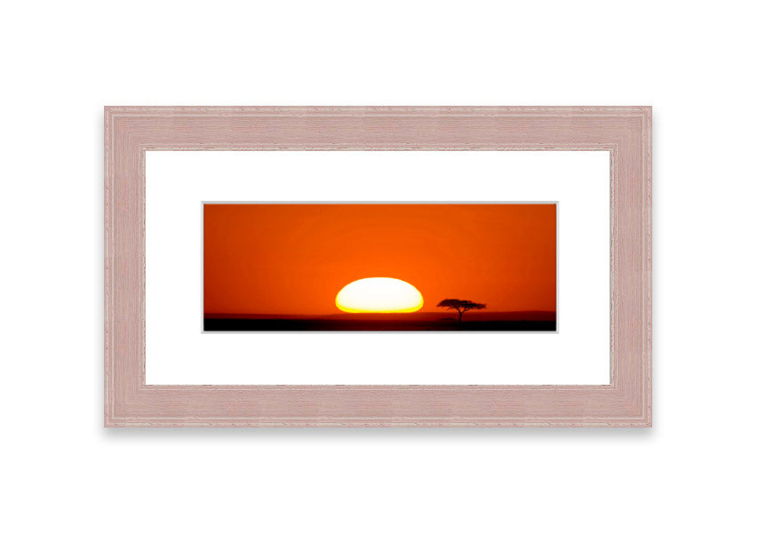 A beautifully framed print of an African sunrise, showcasing vibrant colors and serene landscape, ready to hang.