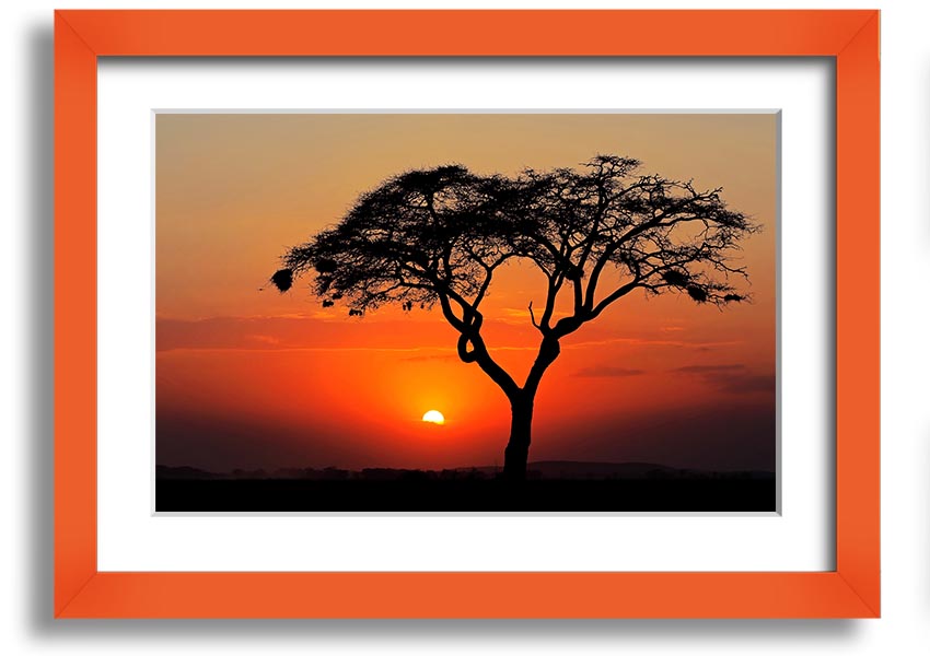 A beautifully framed print of an African sunset, showcasing vibrant colors and serene landscapes, ready to hang.
