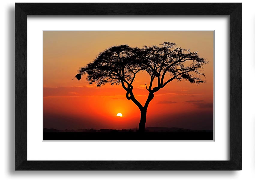 A beautifully framed print of an African sunset, showcasing vibrant colors and serene landscapes, ready to hang.