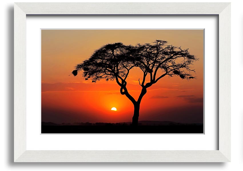 A beautifully framed print of an African sunset, showcasing vibrant colors and serene landscapes, ready to hang.