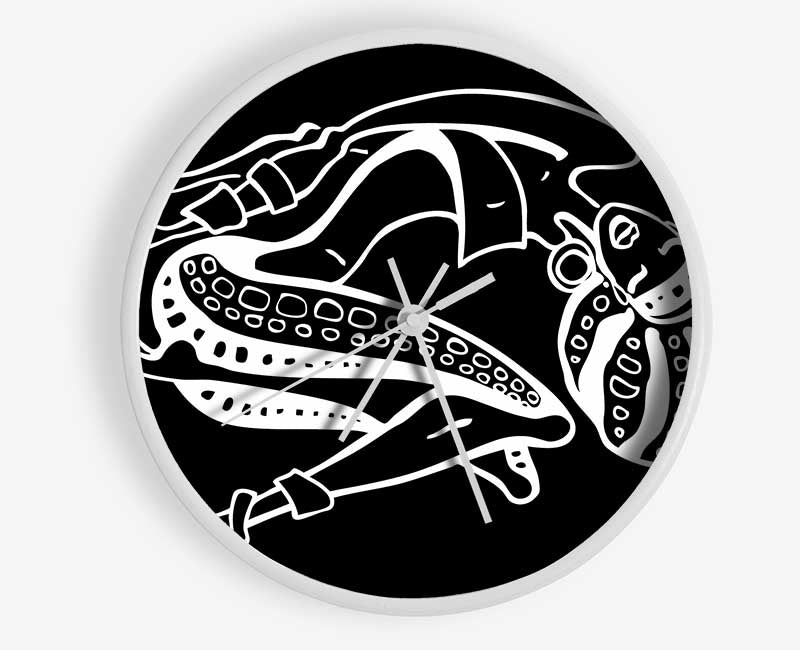 A stylish African Tribal Art clock made from natural bamboo, featuring a round face and available in black, white, or natural frame colors.