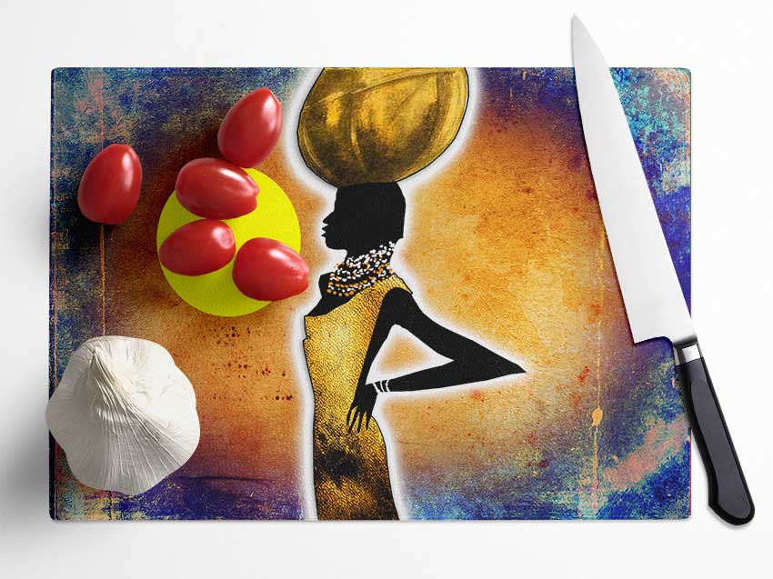 A beautifully designed chopping board featuring African Tribal Art, made from durable tempered glass with a chinchilla ripple effect.