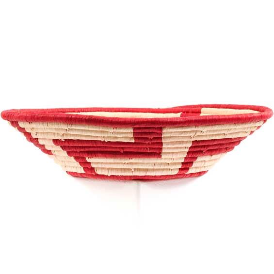 Handcrafted African wall and fruit basket from Rwanda, featuring vibrant colors and unique patterns, perfect for home decor.