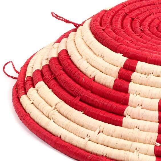 Handcrafted African wall and fruit basket from Rwanda, featuring vibrant colors and unique patterns, perfect for home decor.