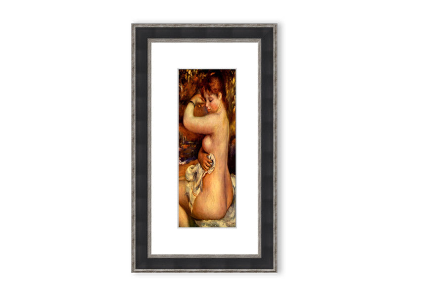 Framed print of Renoir's 'After The Bath', showcasing serene beauty and vibrant colors.