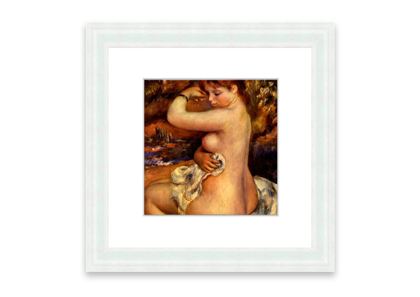 Framed print of Renoir's 'After The Bath', showcasing serene beauty and vibrant colors.