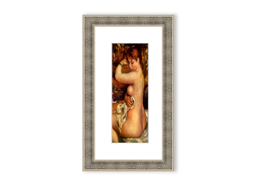 Framed print of Renoir's 'After The Bath', showcasing serene beauty and vibrant colors.