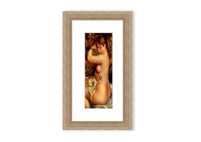 Framed print of Renoir's 'After The Bath', showcasing serene beauty and vibrant colors.
