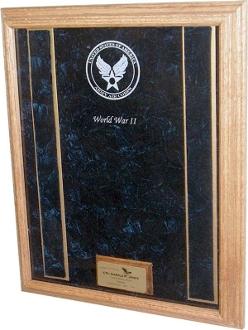 A deluxe Air Force Awards Display Case made of solid oak or walnut, featuring a luxurious crushed velvet interior and space for medals and personal engravings.