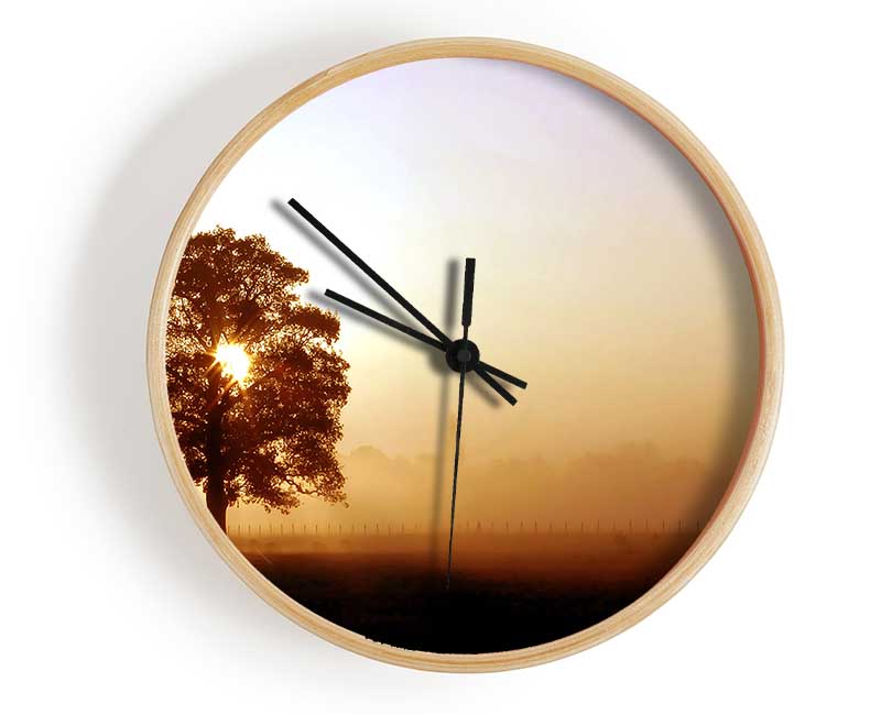 Airfield Sunrise clock made from natural bamboo with a round face, available in black, white, and natural frame colors.