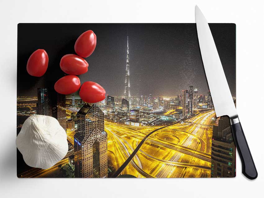 A stylish tempered glass chopping board with a chinchilla ripple effect and anti-slip feet, perfect for food preparation and serving.