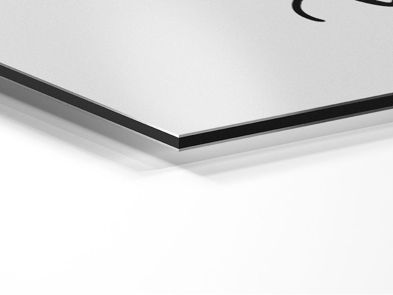 A modern artwork titled 'All You Need Is Love 3' printed on brushed aluminium dibond, showcasing a sleek design with a love-themed message.