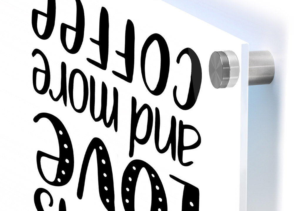 All You Need Is Love Coffee 2 acrylic print on a wall, showcasing vibrant colors and a coffee-themed design.