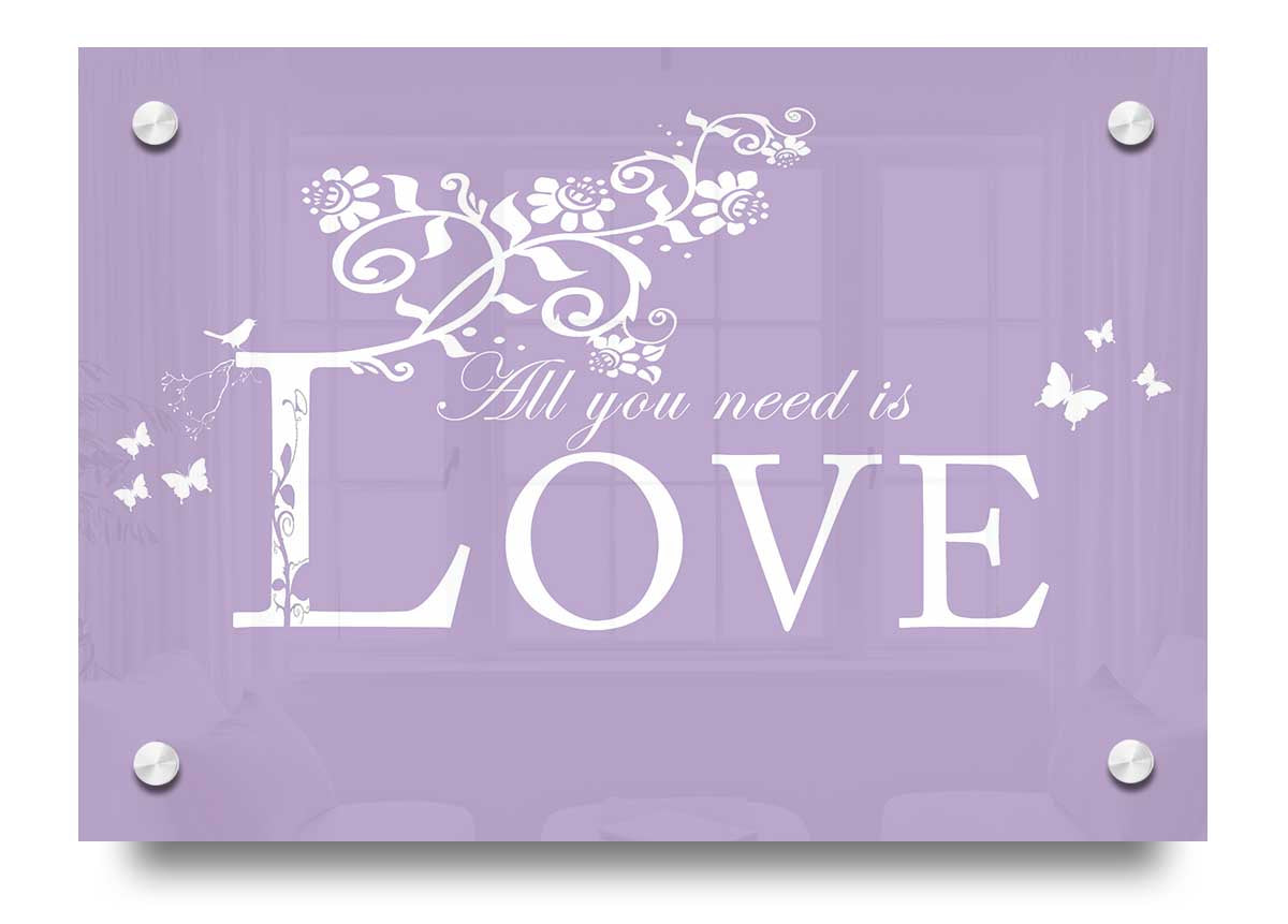 All You Need Is Love Lilac acrylic print on a wall, showcasing vibrant lilac color and elegant design.