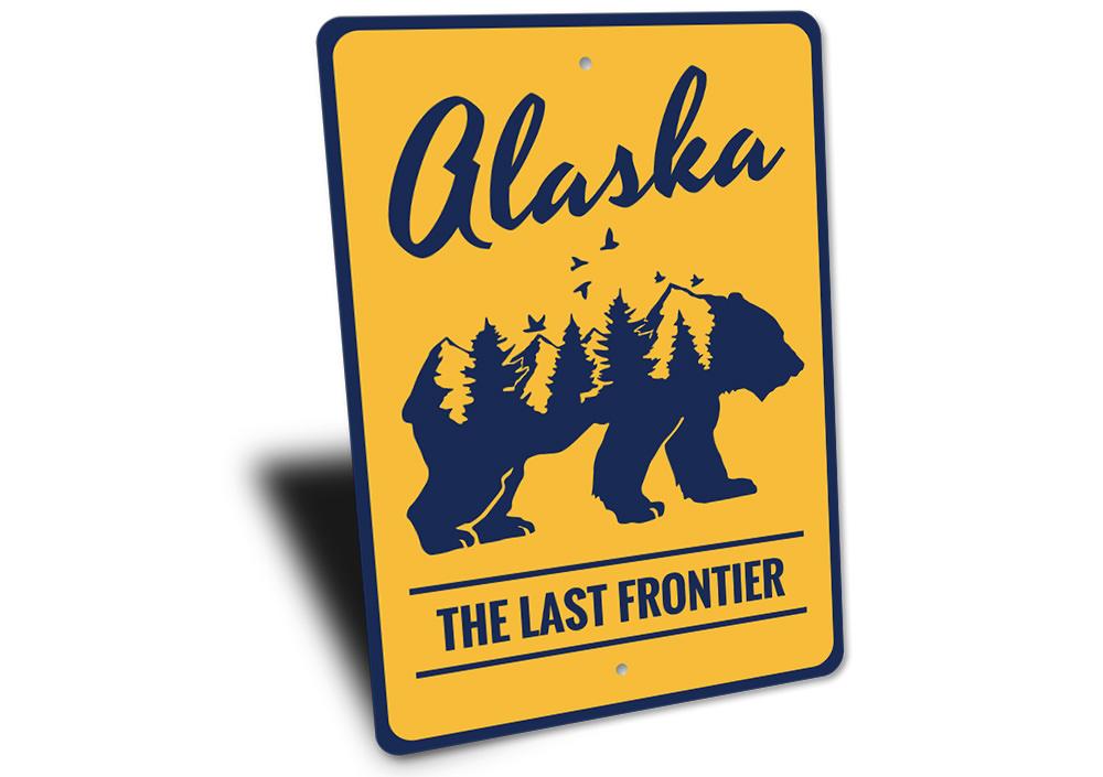 Alaska The Last Frontier Sign made of high-quality aluminum, featuring customizable text and pre-drilled holes for easy mounting.