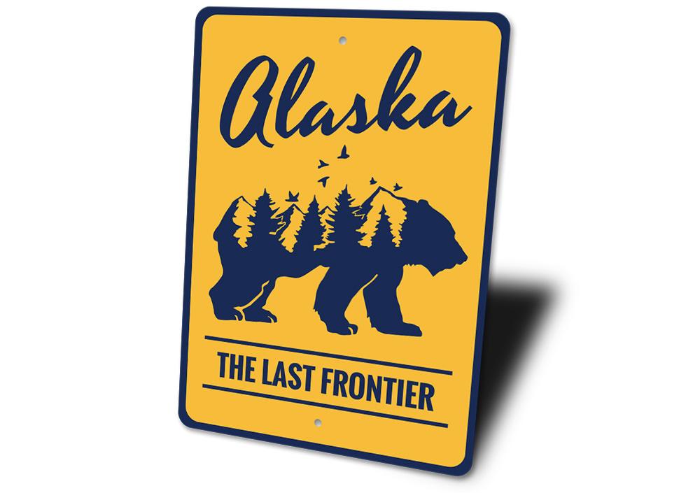 Alaska The Last Frontier Sign made of high-quality aluminum, featuring customizable text and pre-drilled holes for easy mounting.
