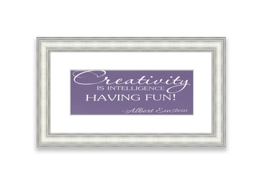 Framed print featuring Albert Einstein's quote on creativity and intelligence in lilac color, elegantly designed for wall decor.