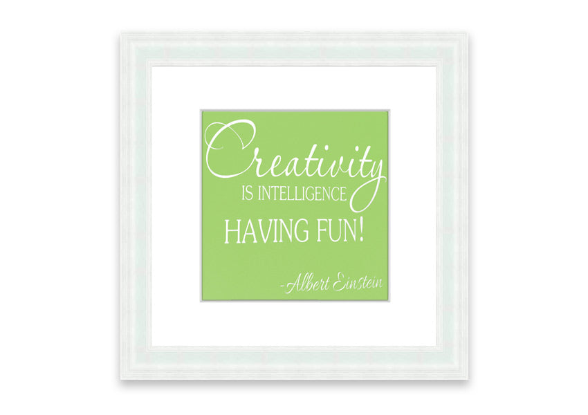 Framed print featuring Albert Einstein's quote 'Creativity Is Intelligence' in vibrant lime green, ready to hang.