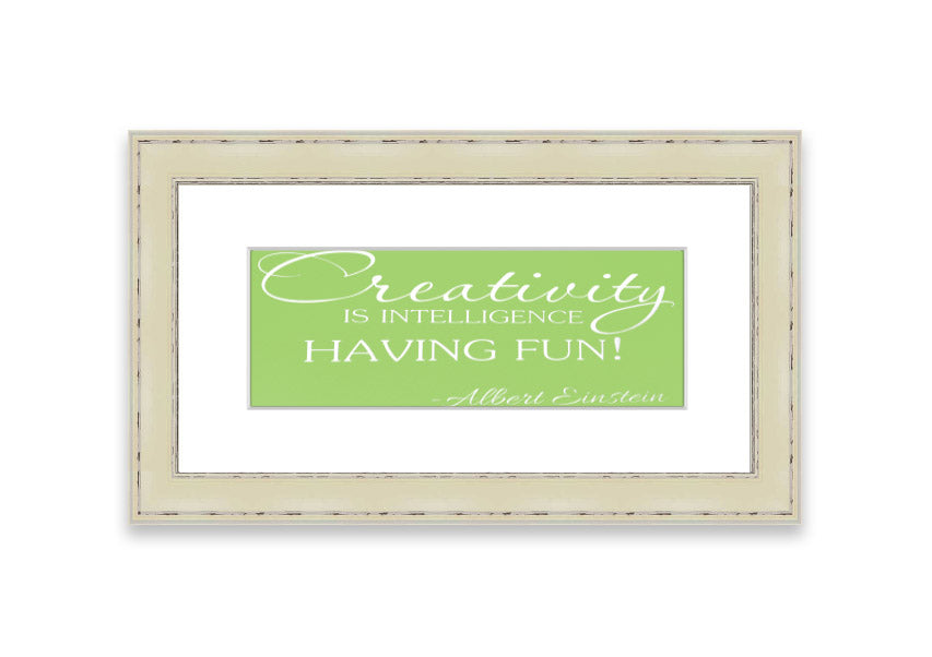 Framed print featuring Albert Einstein's quote 'Creativity Is Intelligence' in vibrant lime green, ready to hang.