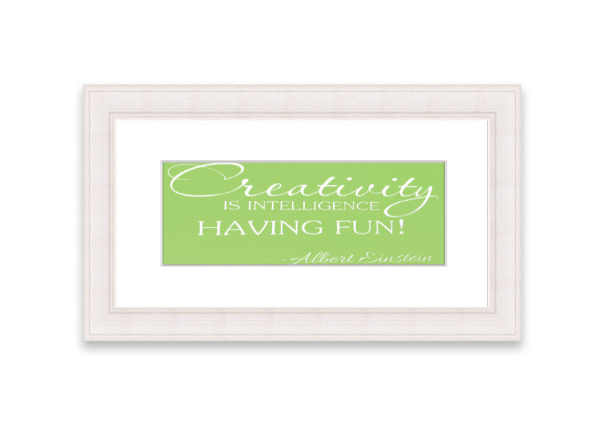Framed print featuring Albert Einstein's quote 'Creativity Is Intelligence' in vibrant lime green, ready to hang.