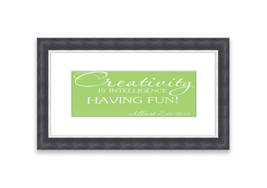 Framed print featuring Albert Einstein's quote 'Creativity Is Intelligence' in vibrant lime green, ready to hang.