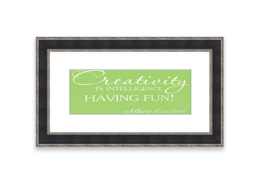 Framed print featuring Albert Einstein's quote 'Creativity Is Intelligence' in vibrant lime green, ready to hang.