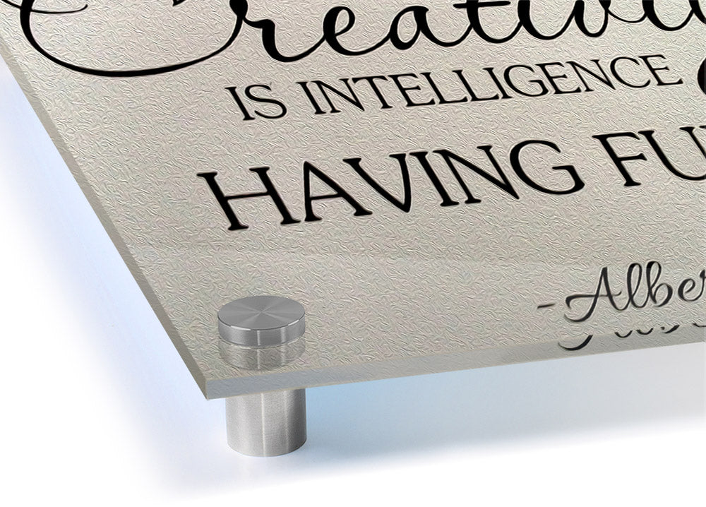 Acrylic print featuring Albert Einstein's quote 'Creativity Is Intelligence' on 5mm thick acrylic glass, ready to hang.