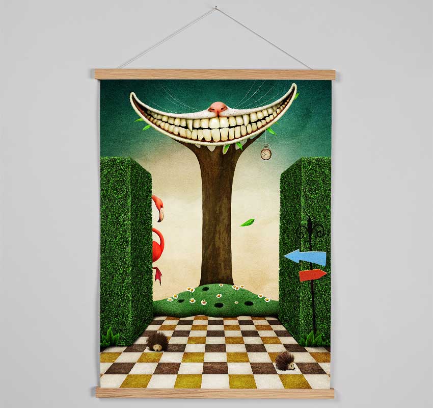 A stylish wooden poster hanger displaying the Cheshire Cat from Alice In Wonderland, featuring a slimline design with magnetic fastening.