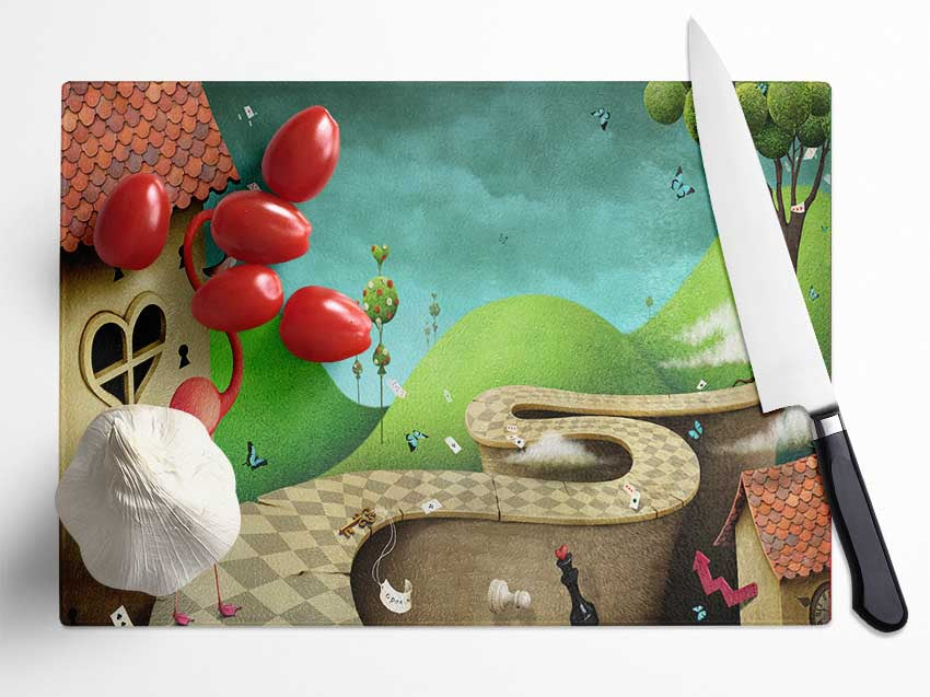 Alice In Wonderland Road chopping board made of tempered glass with a chinchilla ripple effect and anti-slip feet.