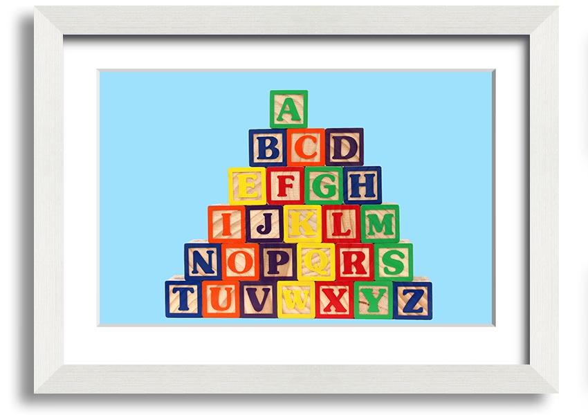 Framed print of Alphabet Blocks in baby blue, showcasing letters in a playful design, ready to hang.