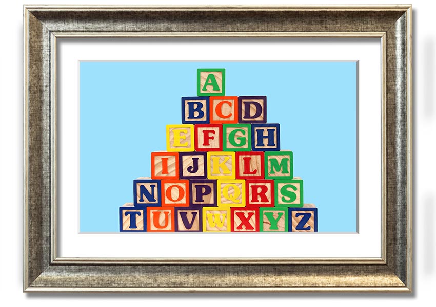 Framed print of Alphabet Blocks in baby blue, showcasing letters in a playful design, ready to hang.