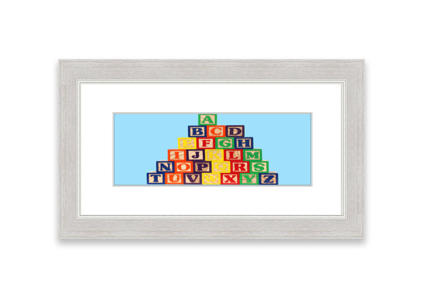 Framed print of Alphabet Blocks in baby blue, showcasing colorful letters, perfect for nursery decor.