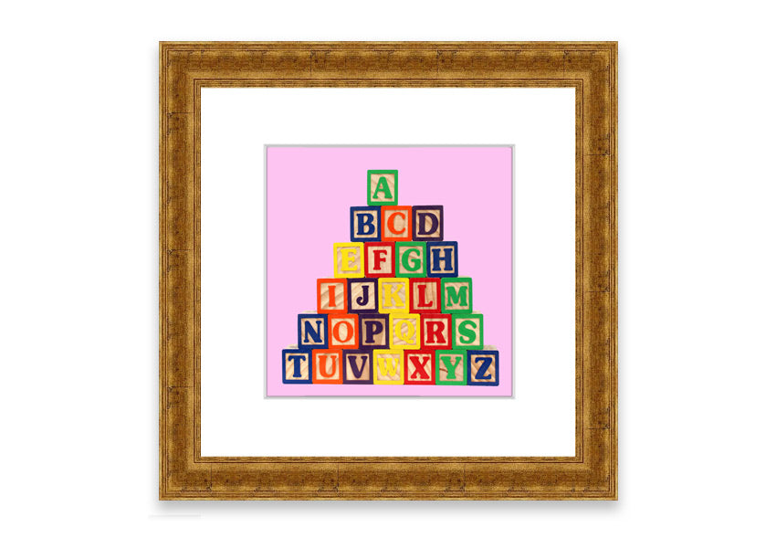 A charming pink framed print featuring colorful alphabet blocks, perfect for children's rooms.