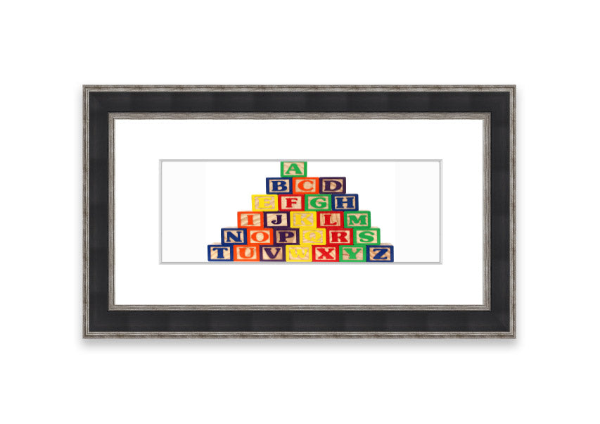 Framed Alphabet Blocks White print showcasing colorful letters, perfect for nursery decor.