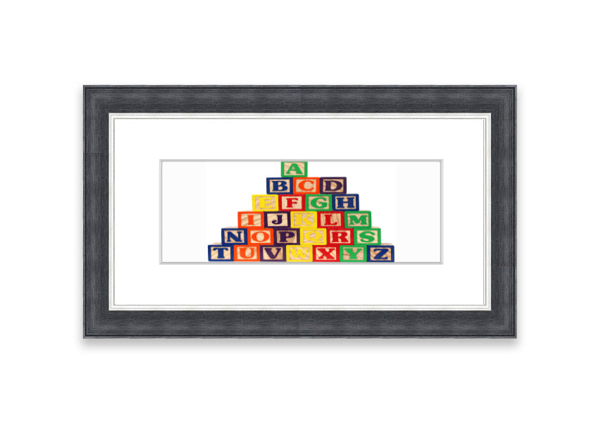Framed Alphabet Blocks White print showcasing colorful letters, perfect for nursery decor.
