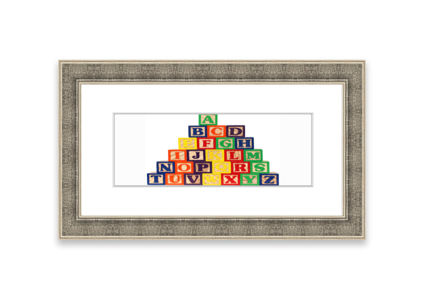 Framed Alphabet Blocks White print showcasing colorful letters, perfect for nursery decor.