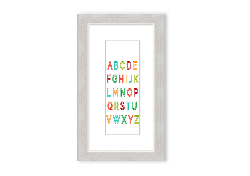 A colorful framed print featuring the alphabet, handmade in the UK, displayed in a stylish frame.