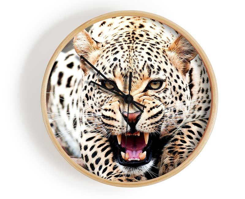 Amazing Cheetah clock made from natural bamboo with a round face and clear Plexiglas lens, available in black, white, and natural frame colors.