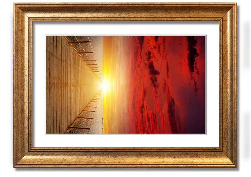 A beautifully framed print of a sunset over a boardwalk, showcasing vibrant colors and serene scenery.