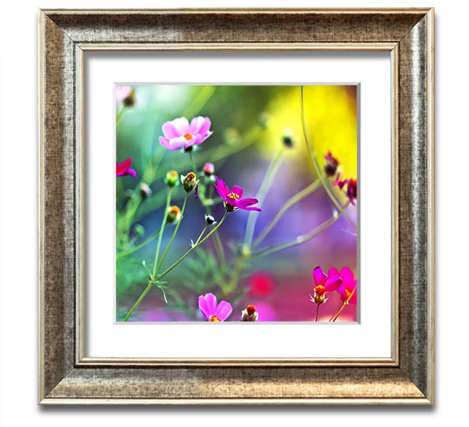 A beautifully framed print of vibrant wildflowers, showcasing intricate details and colors, ready to hang on a wall.