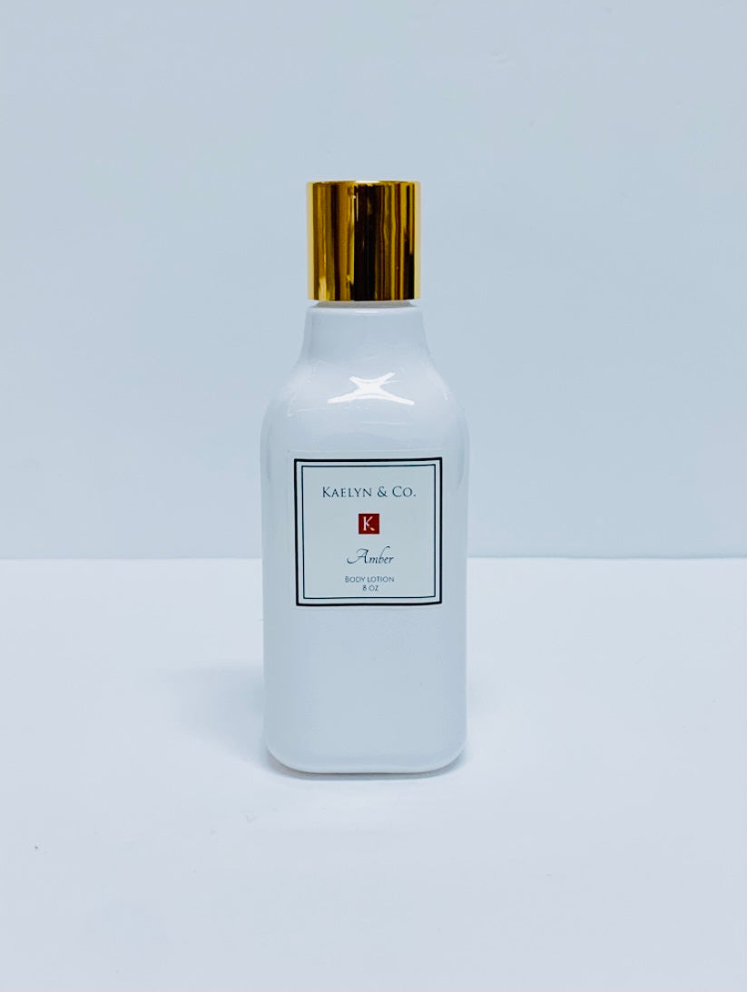Amber Body Lotion 8oz bottle with a rich amber color and elegant design, showcasing its luxurious formula and essential oil blend.