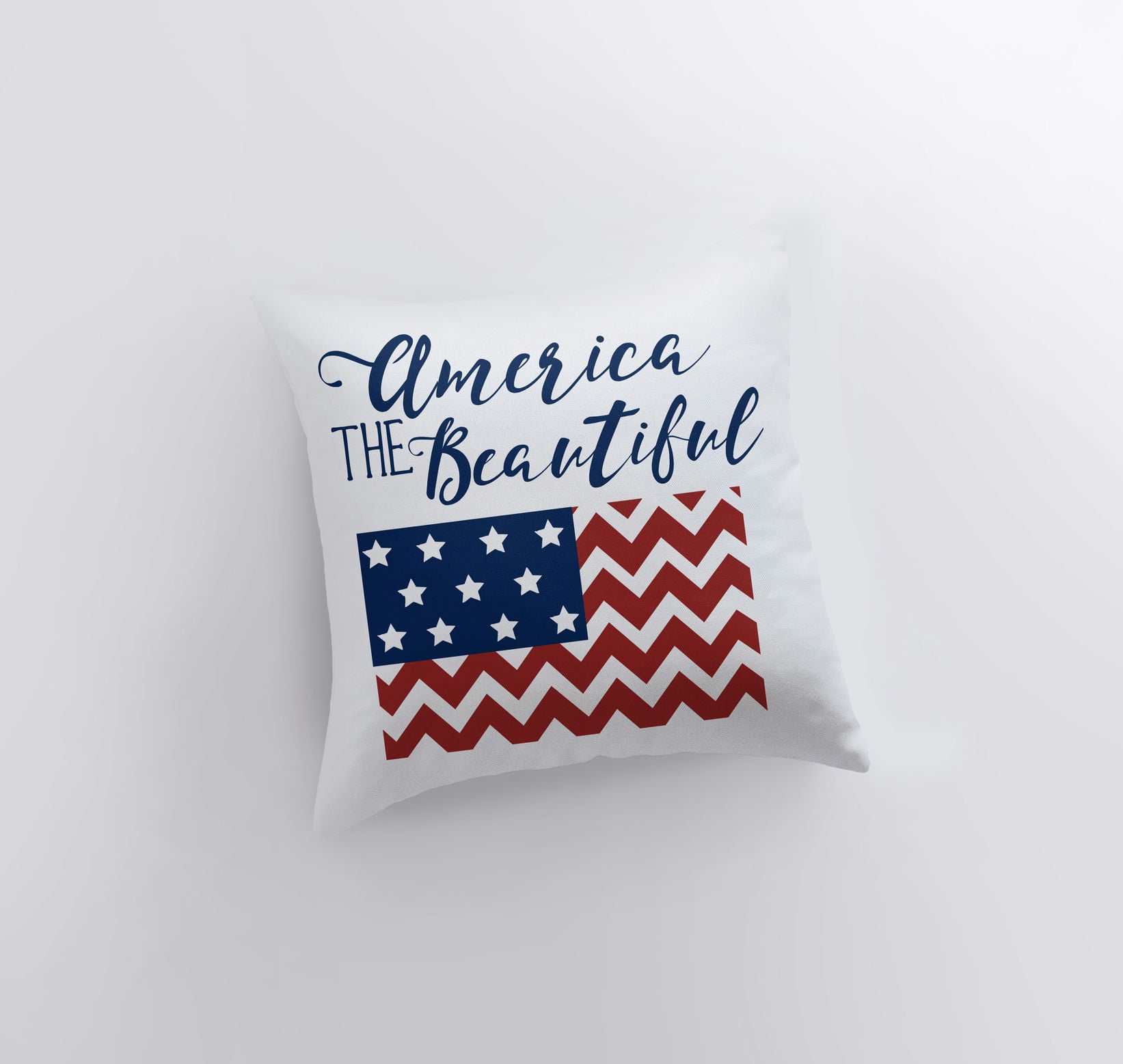 America the Beautiful pillow cover featuring 'God Bless America' design with red stripes on the back, handmade in America.