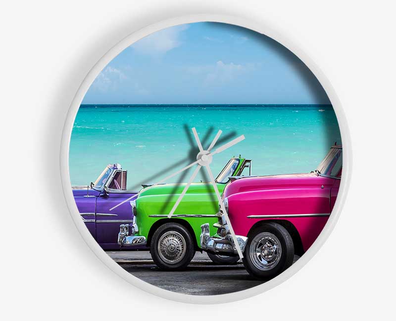 American Classic 11 bamboo clock with a round face, available in black, white, and natural frame colors, featuring a clear Plexiglas lens.