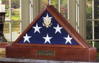 American Flag Case Pedestal made of solid walnut, featuring beveled glass and gold Great Seal of the U.S., designed for burial flags.