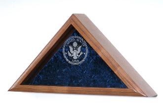 Elegant American Flag Display Case made from solid wood with a laser engraved service emblem and crushed velvet backing.
