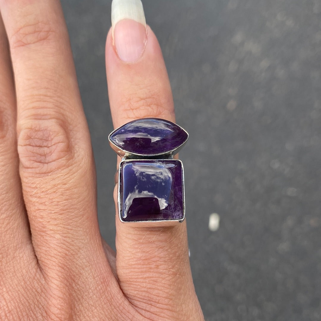 Amethyst Sterling Silver Ring size 5, featuring a beautiful purple amethyst stone set in a polished sterling silver band.