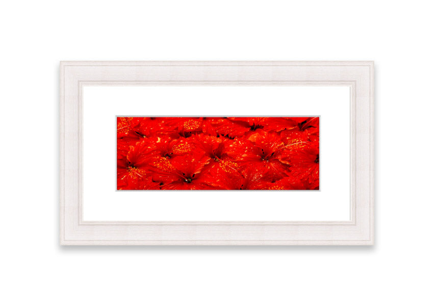 Framed print of vibrant red leaves, showcasing autumn colors, ready to hang.