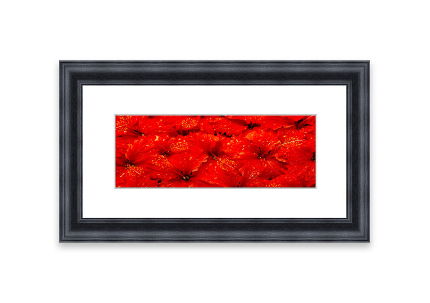 Framed print of vibrant red leaves, showcasing autumn colors, ready to hang.