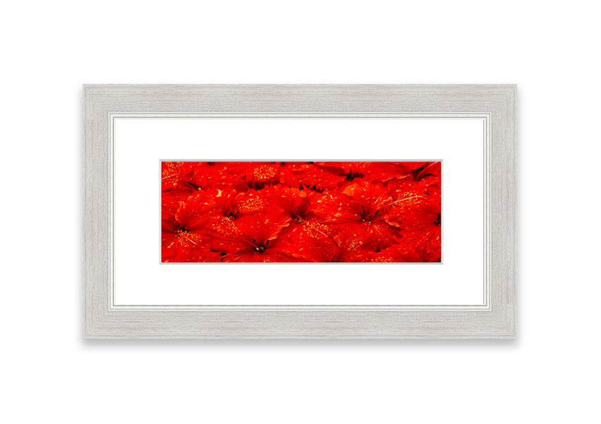 Framed print of vibrant red leaves, showcasing autumn colors, ready to hang.